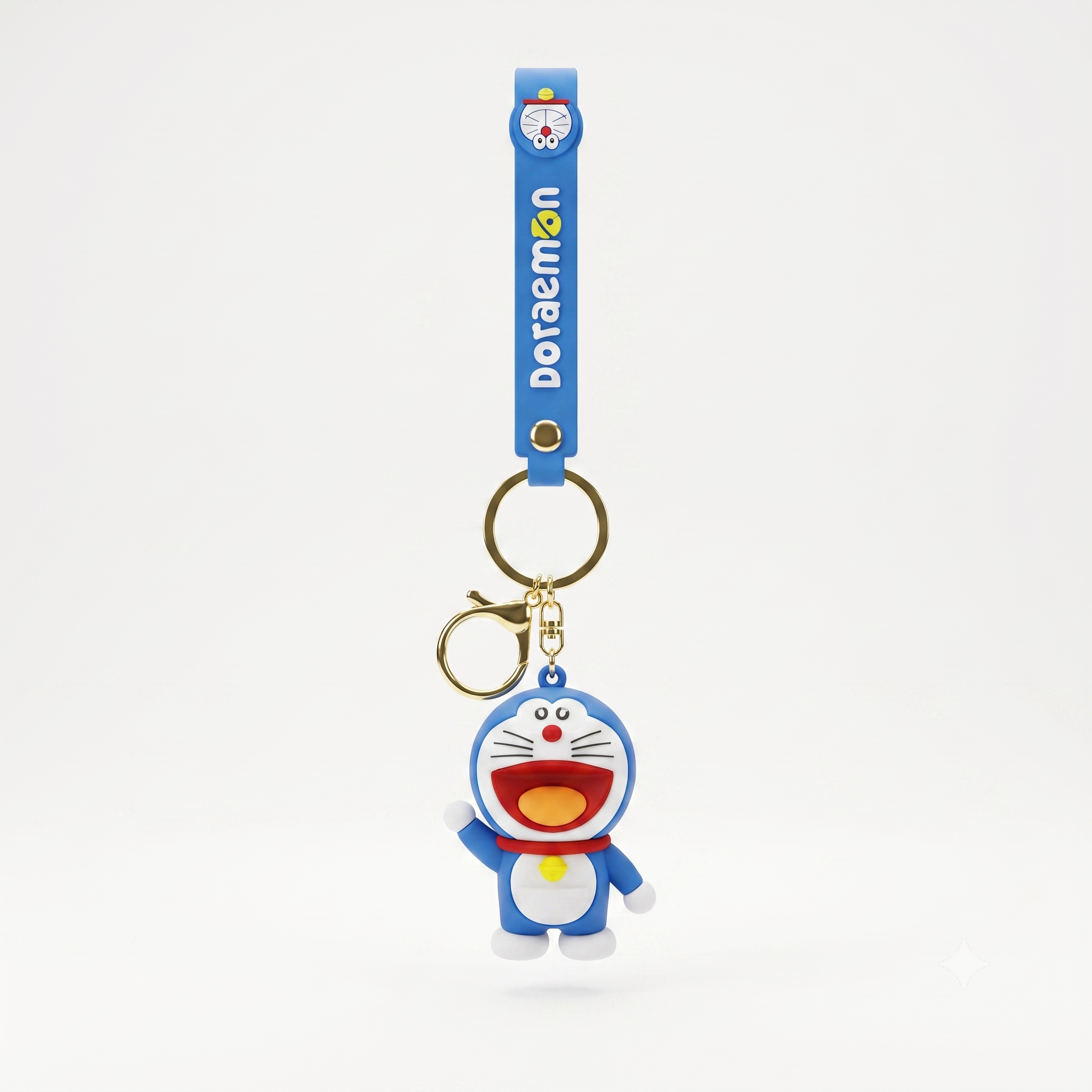 A blue and white Doraemon keychain featuring a 3D character charm of Doraemon with a gold-tone key ring and a blue strap printed with 'Doraemon' in white.