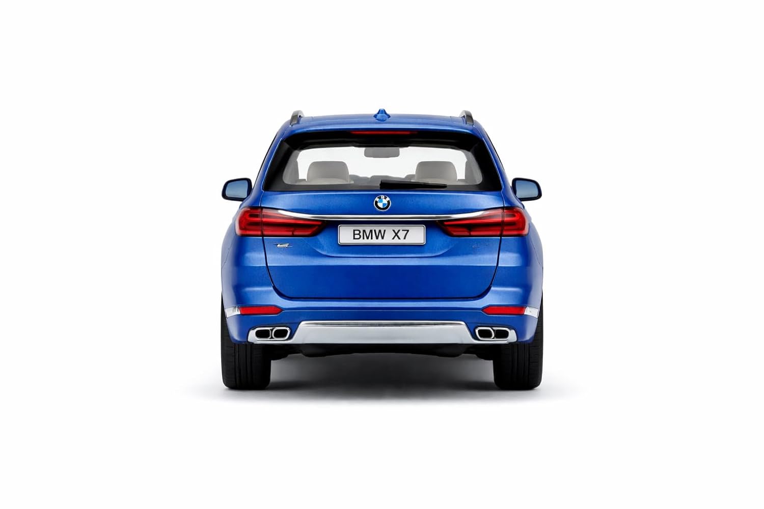 Blue BMW X7 SUV shown from a rear three-quarter view on a white background