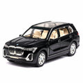 Black SUV model car on a white background