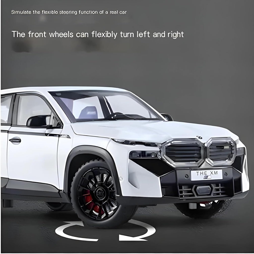 White car model with front wheels turning left and right on a dark background
