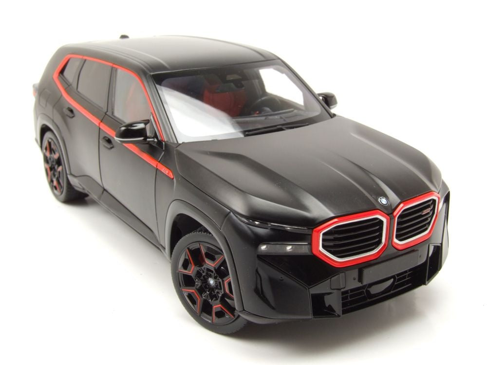 Black SUV with red accents on a white background
