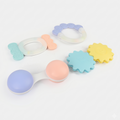 Set of colorful baby teething rings on a white background