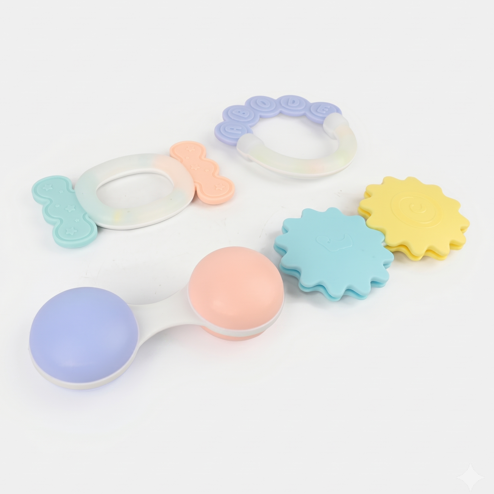 Set of colorful baby teething rings on a white background