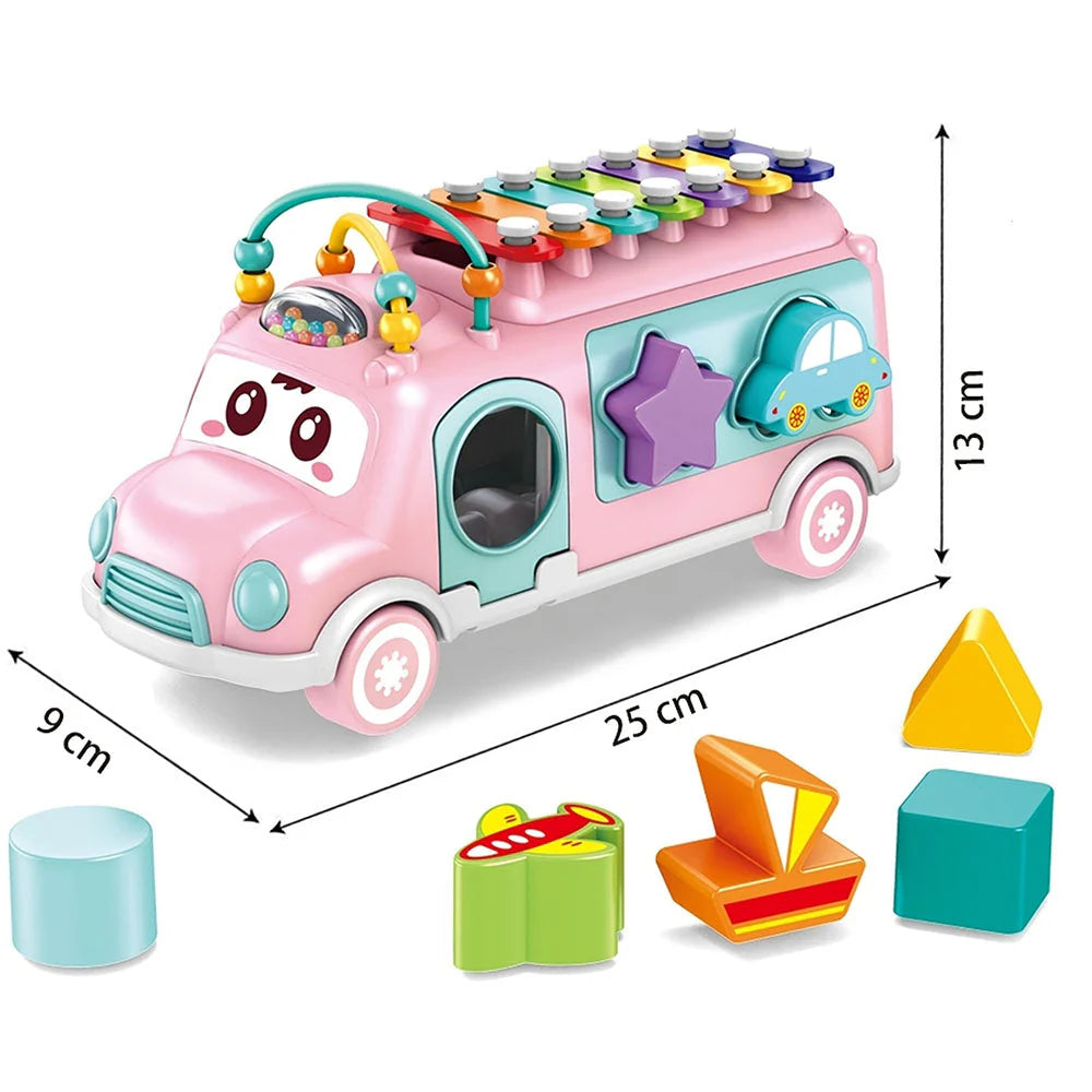 Pink toy car with colorful features and shape sorting blocks on a white background