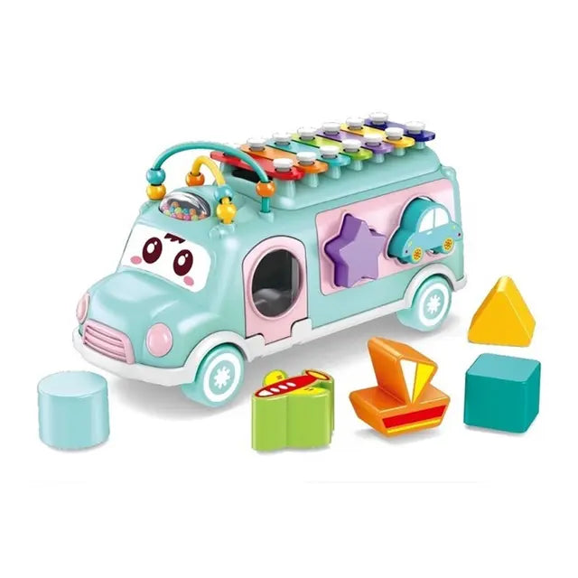 Colorful toy bus with shape sorting blocks on a white background
