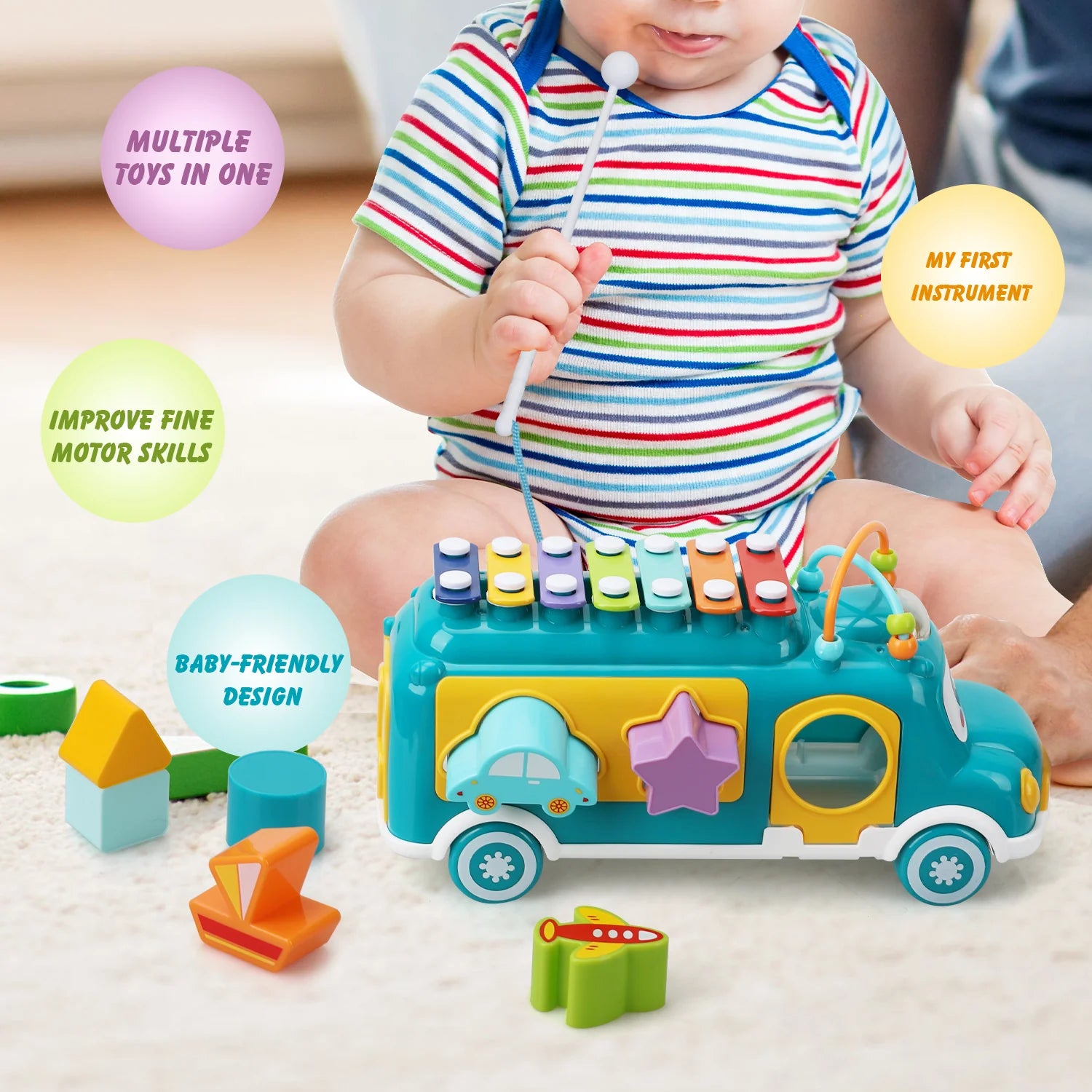 Child playing with a colorful toy bus on a light surface