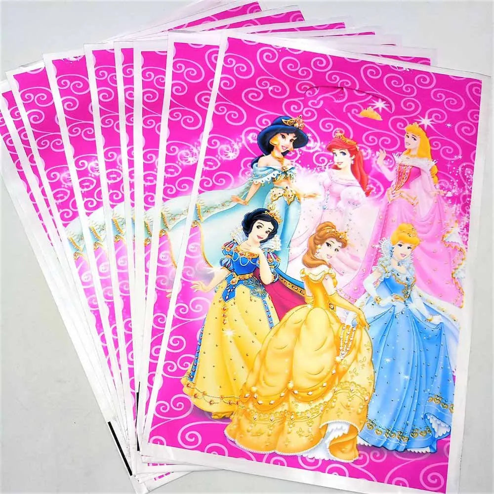 A set of children's party napkins featuring Disney princesses, fanned out on a light gray background. The napkins have a bright pink background with white swirl patterns and illustrations of Snow White, Cinderella, Belle, Ariel, Jasmine, and Aurora in colorful dresses.