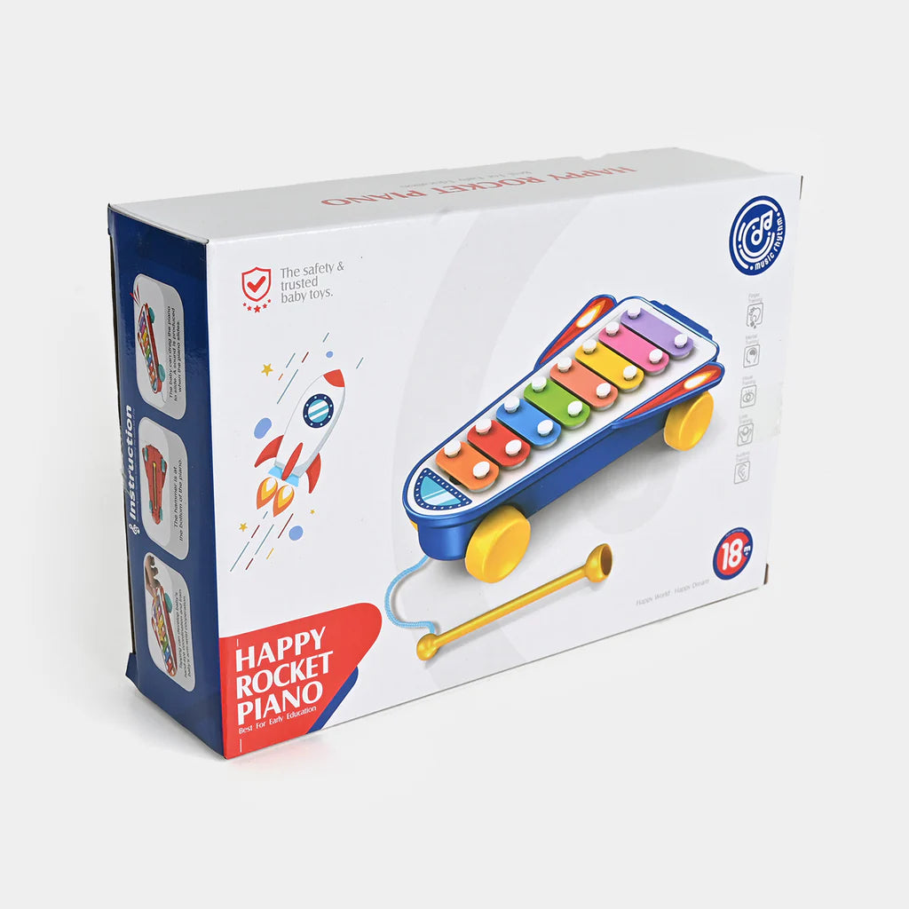 Box of a toy piano with colorful design on a white background
