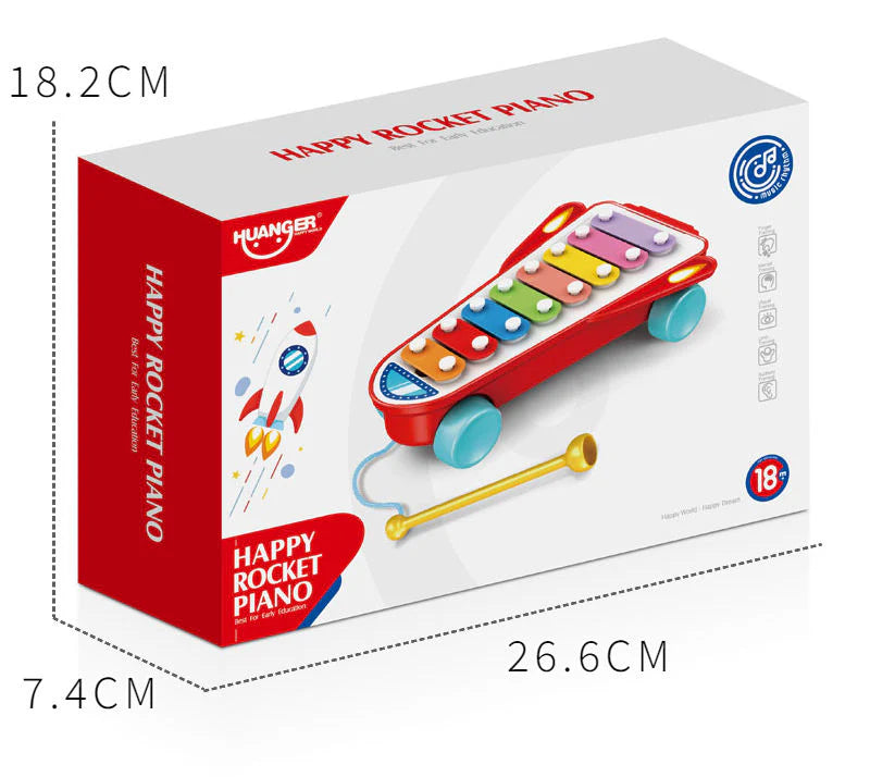 Box of a colorful toy piano with dimensions labeled