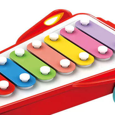 Colorful toy xylophone with red frame on a white background