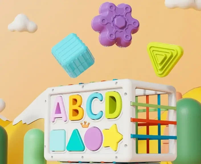 Colorful toy block with letters and shapes on a yellow background
