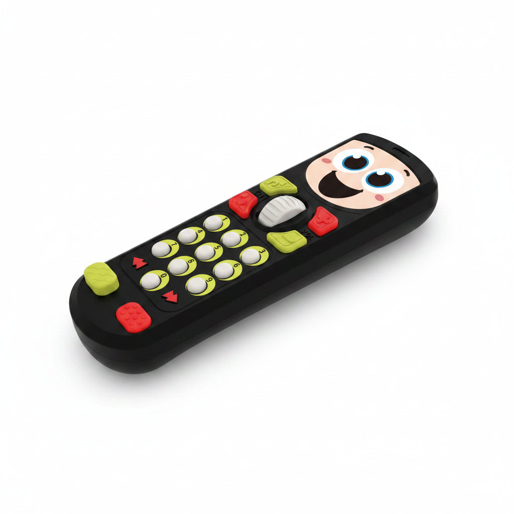 Toy remote control with cartoon face and colorful buttons on a white background