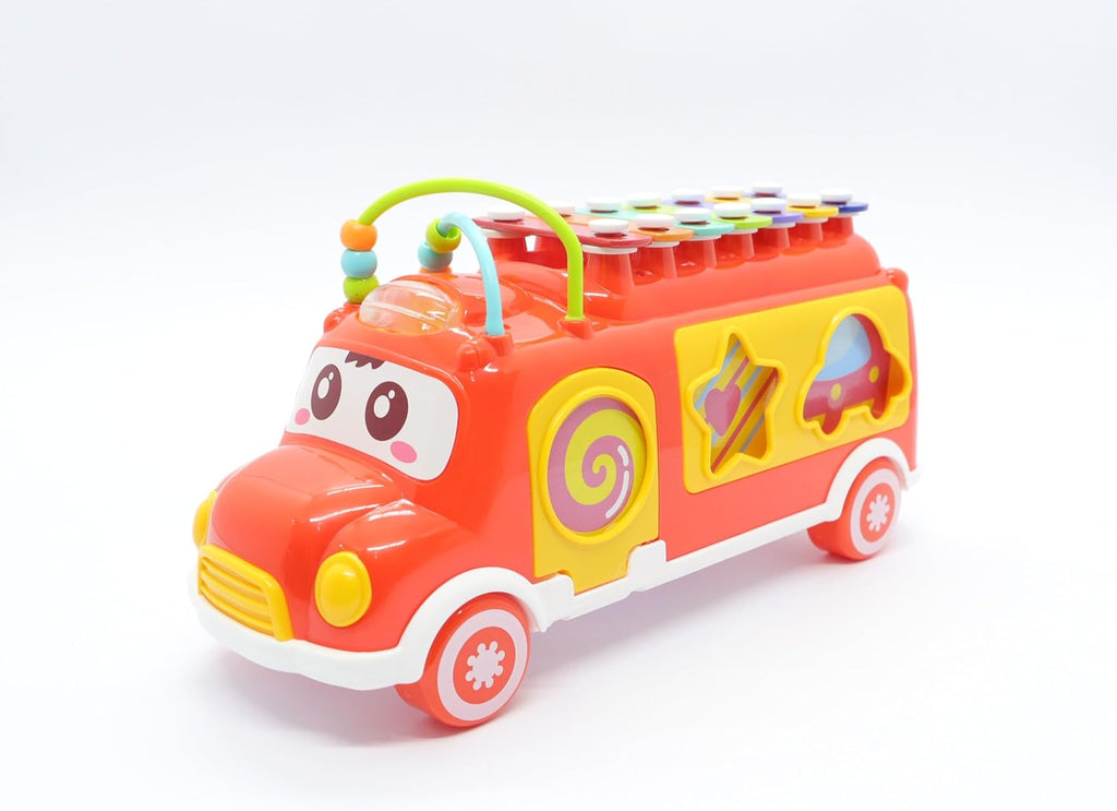 Colorful toy bus with cartoon face on a white background