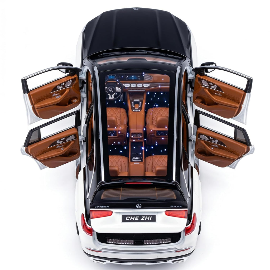 Top-down view of a luxury car with open doors on a white background