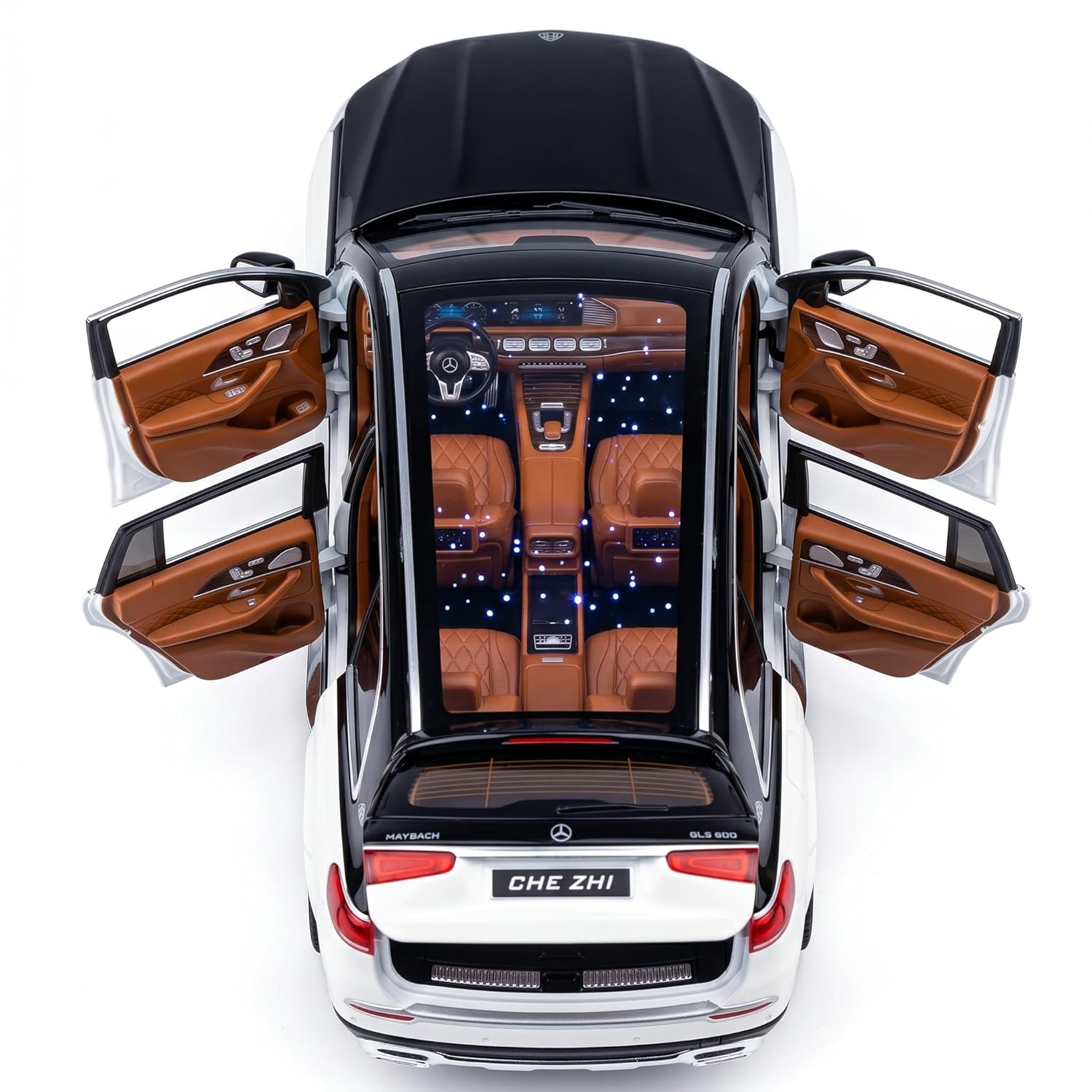 Top-down view of a luxury car with open doors on a white background