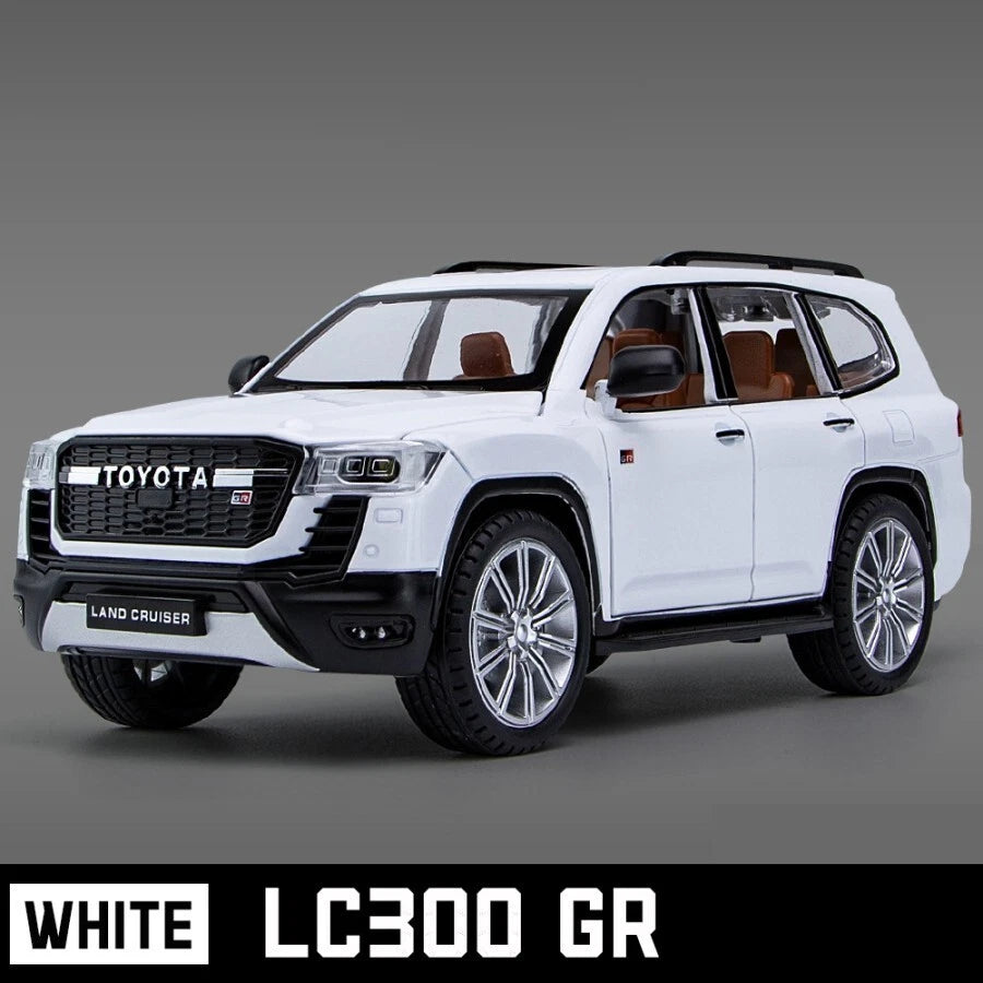White Toyota Land Cruiser LC300 GR on a gray background