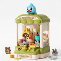 Toy claw machine with various small toys inside on a white background